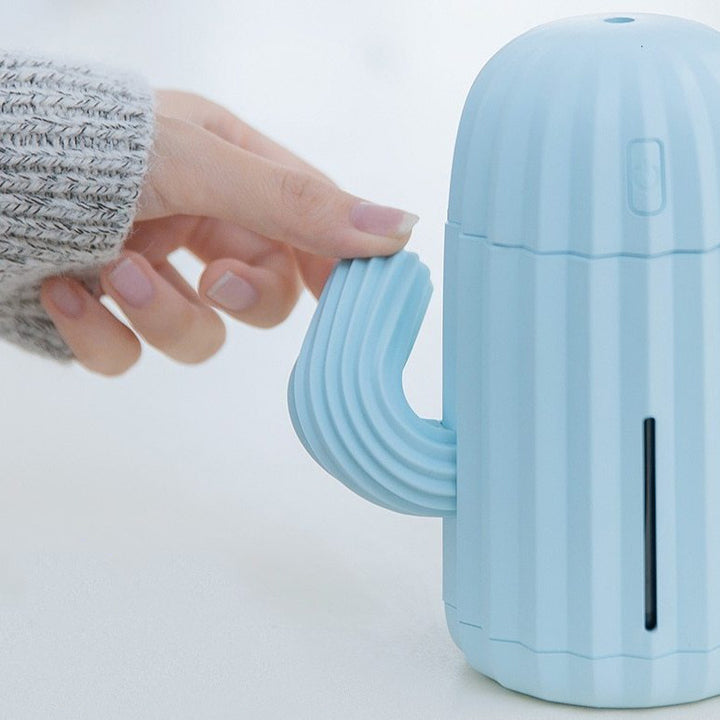 VibeCore Cactus Humidifier sky blue with squishy arm, featuring a playful cactus design, 340ml tank, and quiet operation, perfect for adding charm and freshness to any space.