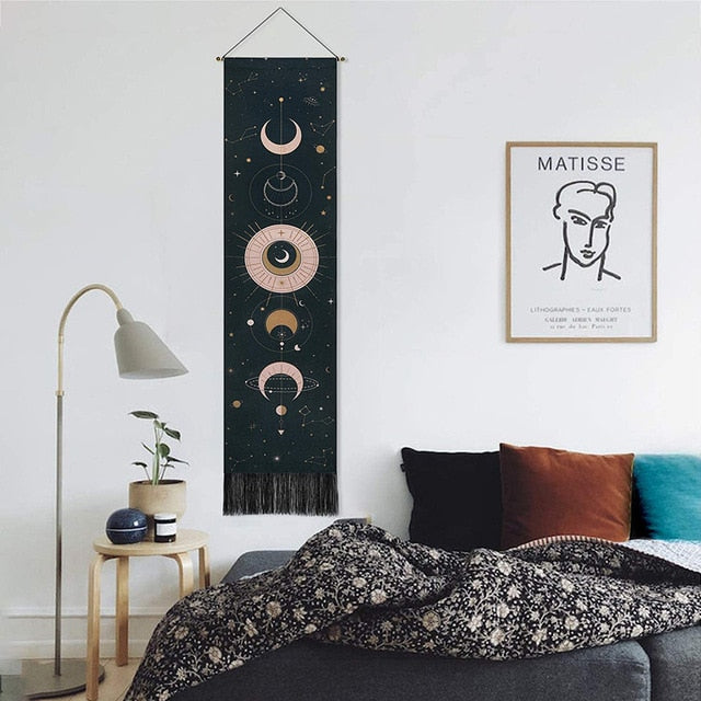 Celestial Moon Phases Wall Hanging in black, a boho-chic cotton-linen tapestry featuring moon phases, adding a celestial and mystical touch to your room decor.