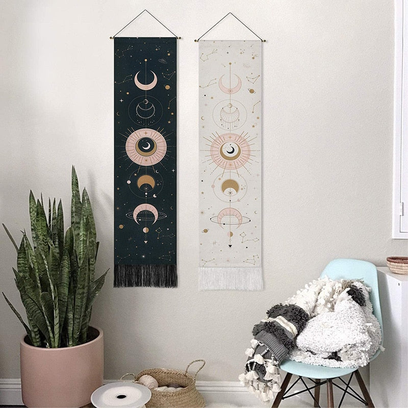 Celestial Moon Phases Wall Hanging in black and white on an apartment wall, featuring a mystical moon phase design that enhances the space with a boho-chic celestial vibe.