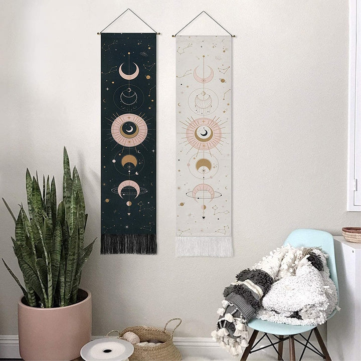 Celestial Moon Phases Wall Hanging in black and white on an apartment wall, featuring a mystical moon phase design that enhances the space with a boho-chic celestial vibe.