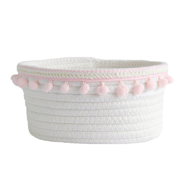 VibeCore Cotton Rope Storage Basket in light pink, handmade with natural cotton and jute, ideal for organizing and adding a decorative touch to your bedroom, dorm, or apartment.