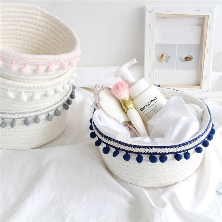 VibeCore Cotton Rope Storage Basket in navy, handmade with natural cotton and jute, filled with products, offering a stylish and functional storage solution for any space.