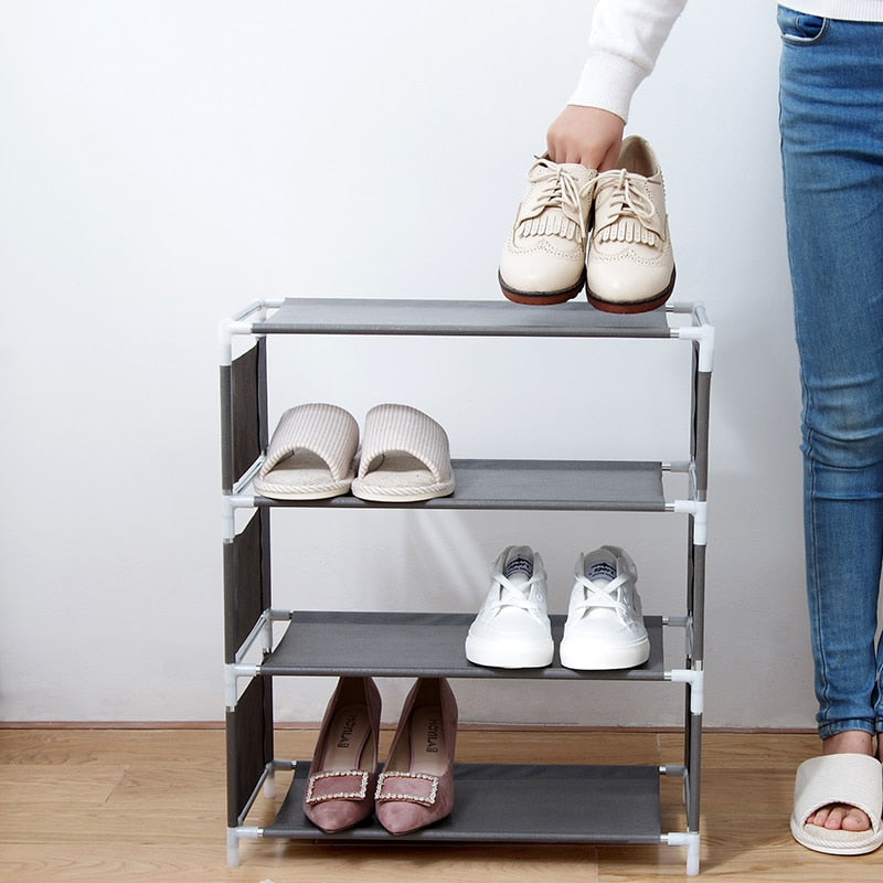 VibeCore Fabric Assembled Shoe Rack in Gray – space-saving, multi-layer storage for shoes, bags, and accessories. Made with breathable, moisture-proof fabric, this dust-proof, easy-to-assemble rack is perfect for bedrooms, dorm rooms, apartments, and homes. Durable, compact design for organizing and decluttering small spaces.