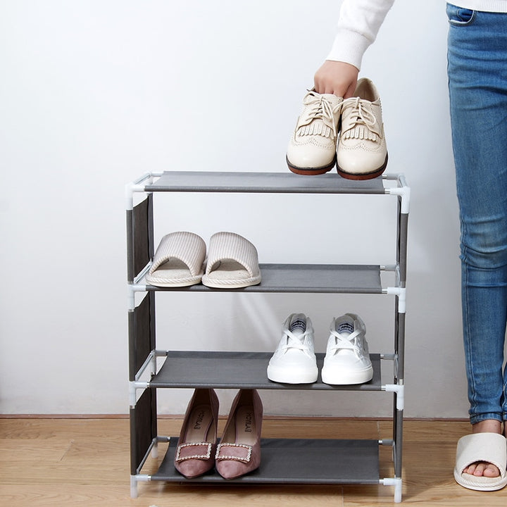 VibeCore Fabric Assembled Shoe Rack in Gray – space-saving, multi-layer storage for shoes, bags, and accessories. Made with breathable, moisture-proof fabric, this dust-proof, easy-to-assemble rack is perfect for bedrooms, dorm rooms, apartments, and homes. Durable, compact design for organizing and decluttering small spaces.
