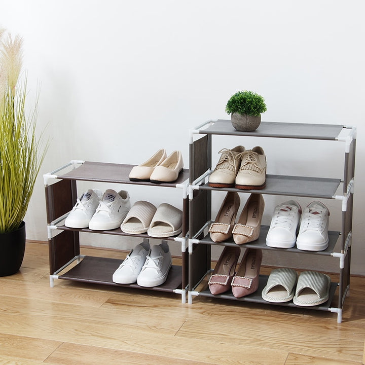 VibeCore Fabric Assembled Shoe Rack in Gray and Brown – space-saving, multi-layer storage for shoes, bags, and accessories. Made with breathable, moisture-proof fabric, this dust-proof, easy-to-assemble rack is perfect for bedrooms, dorm rooms, apartments, and homes. Durable, compact design for organizing and decluttering small spaces.