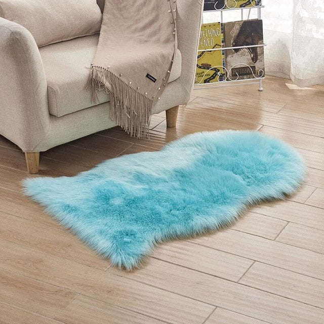 VibeCore Faux Sheepskin Rug/Chair Cover in light blue, offering a soft, plush texture for a cozy and stylish addition to any space, ideal for use as a rug or draped over a chair to enhance room decor.