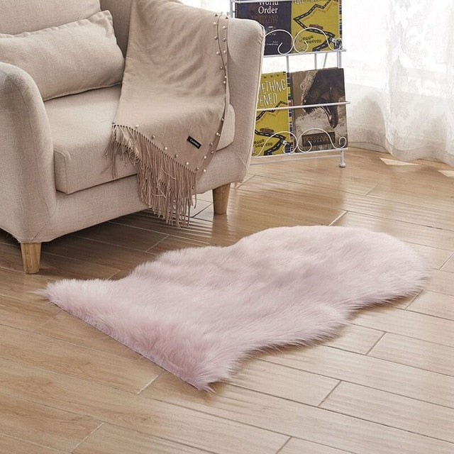 VibeCore Faux Sheepskin Rug/Chair Cover in light pink, featuring a soft, fluffy texture that adds a cozy, feminine touch to any room, perfect for the floor or draping over a chair for extra comfort and style.