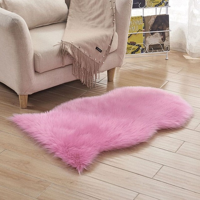 VibeCore Faux Sheepskin Rug/Chair Cover in pink, offering a plush, cozy texture that enhances the warmth and aesthetic of any space, perfect for use as a rug or draped across a chair for a chic look.