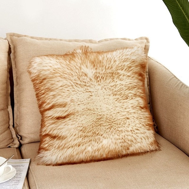 VibeCore Fluffy Faux Fur Pillow Case with brown tips, showcasing a luxurious, textured design on a couch.