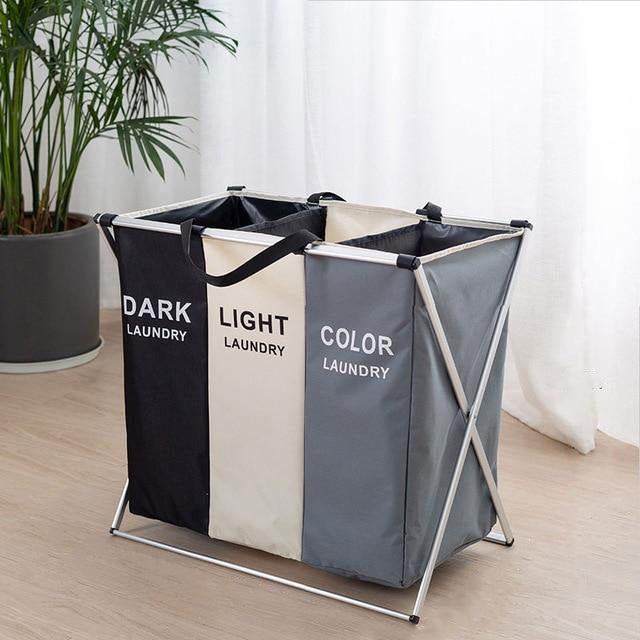 VibeCore Foldable Laundry Basket Organizer in three colors, showcasing a large-capacity, waterproof design with reinforced handles, placed in a bedroom or dorm for efficient laundry sorting.