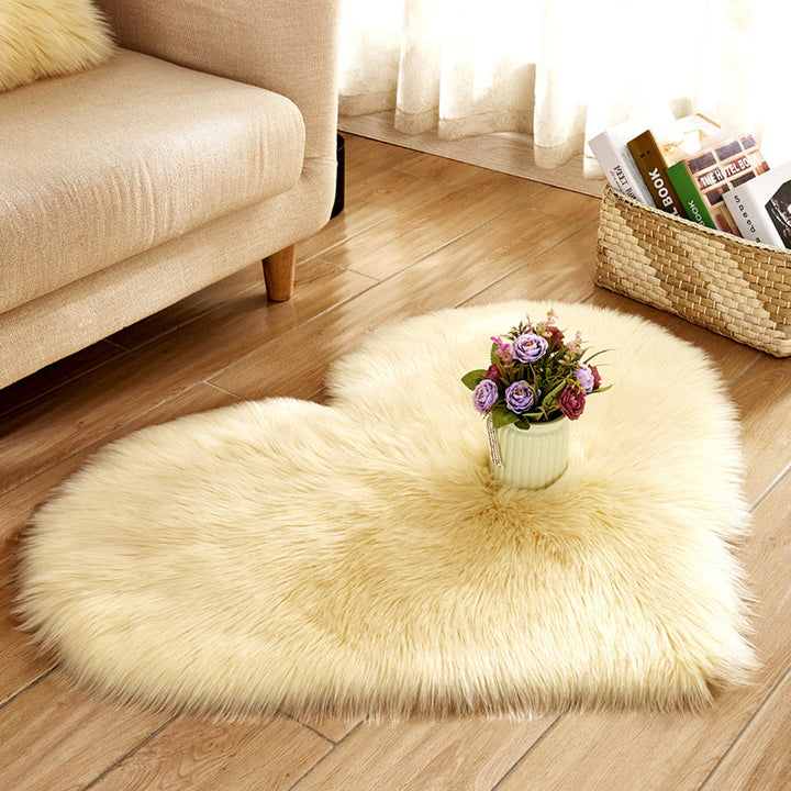 VibeCore Heart-Shaped Accent Rug in yellow, made from soft faux sheepskin with a non-slip backing, offering a cozy and vibrant touch to any room's decor.