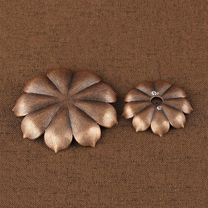 VibeCore Lotus Incense Holder, set of 2 pieces, showing the backside with a smooth, flat base for stability, designed with a 3-layer lotus structure and 5 incense holder holes.