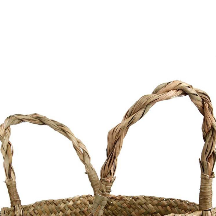 Close-up of the VibeCore MALA Handmade Macrame Basket handle, showcasing the intricate handwoven cotton and wicker design for a sturdy and stylish storage solution.