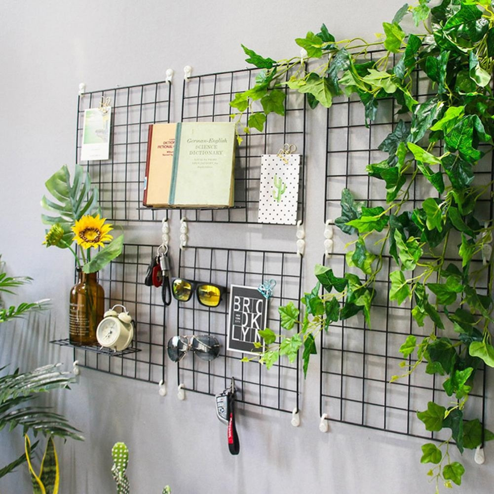 VibeCore Metal Frame Wall Display with 6 products on the wall, featuring a durable aluminum frame, minimalist design, photo display, artwork holder, and easy mounting.