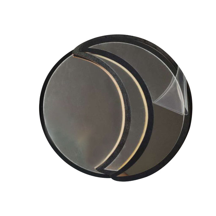 VibeCore Moon Phases Mirror Set in black, package contents. The set includes five sleek black mirrors representing the phases of the moon, adding a mystical, boho-inspired touch to any room. Perfect for creating a celestial ambiance, the package contains everything needed to enhance your decor with a cosmic, modern design.