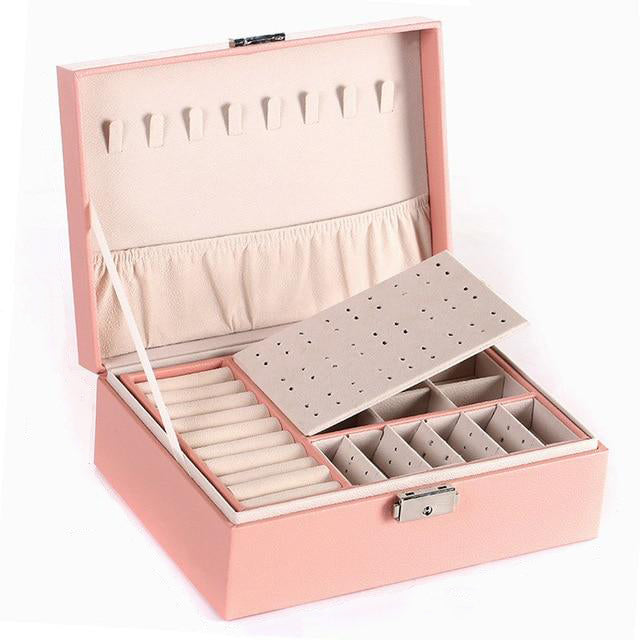 VibeCore Multi-Layer Jewelry Box in Blossom – sleek, lockable design with two layers and bonus top storage. Ample space for organizing rings, necklaces, and earrings. Perfect for travel, everyday use, and a thoughtful gift for any occasion.