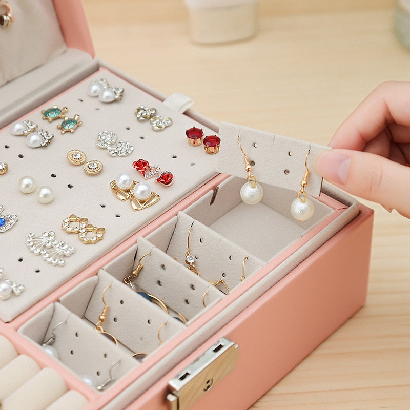 Close-up of the earring holder in the VibeCore Multi-Layer Jewelry Box in Blossom, designed for organizing and protecting earrings. Featuring a sleek, lockable design with a removable layer for flexible storage, perfect for travel or everyday use.