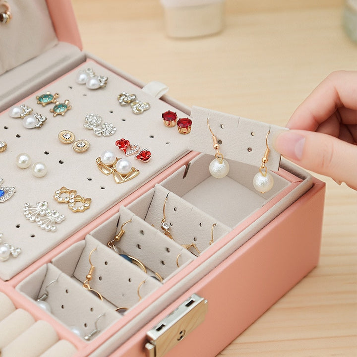 Close-up of the earring holder in the VibeCore Multi-Layer Jewelry Box in Blossom, designed for organizing and protecting earrings. Featuring a sleek, lockable design with a removable layer for flexible storage, perfect for travel or everyday use.