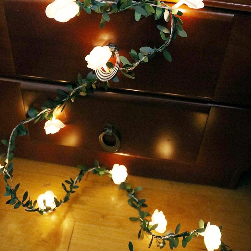 VibeCore rose flower string lights in the bedroom, casting a warm, cozy glow that adds a touch of charm and vibrancy to the space.
