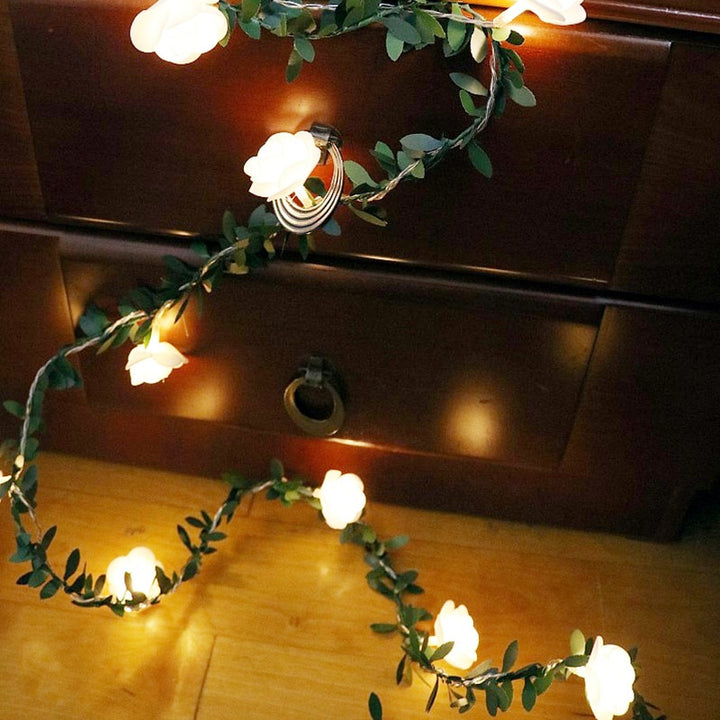 VibeCore rose flower string lights in the bedroom, casting a warm, cozy glow that adds a touch of charm and vibrancy to the space.