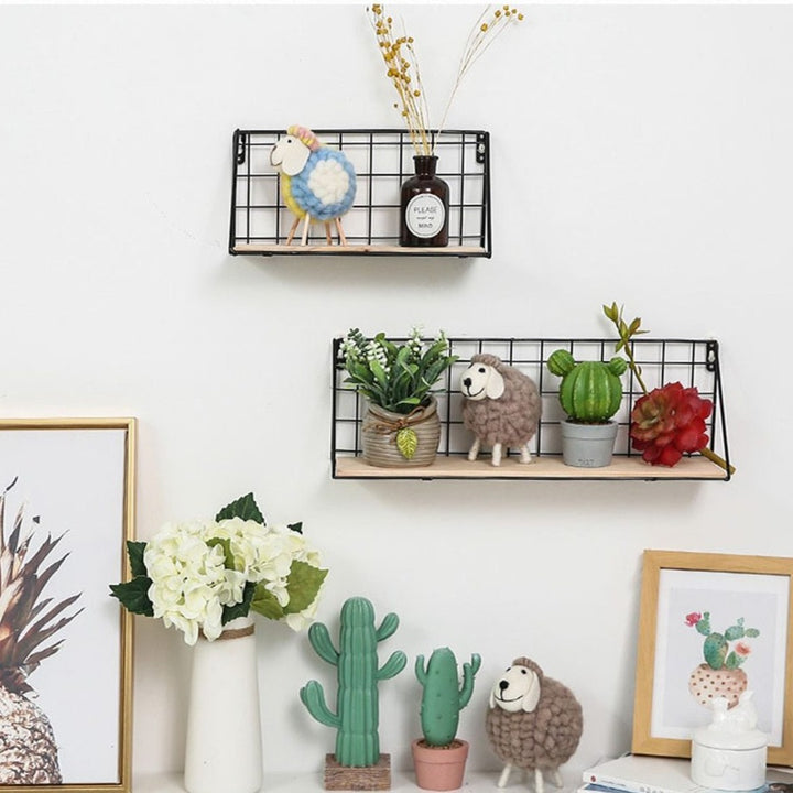 VibeCore Wood+Iron Wall Shelf Black (S and L) mounted on the wall, offering stylish, space-saving storage for books, plants, and decor. The rustic industrial design adds charm while maximizing vertical space in any room.
