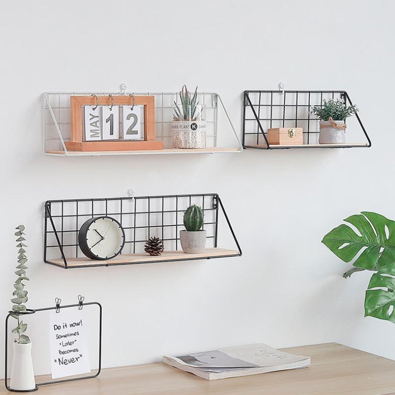 VibeCore Wood+Iron Wall Shelf Black (S and L) and White (L) on the wall above a desk, offering stylish, space-saving storage for books, plants, and decor. Perfect for adding rustic charm and functionality to any room.